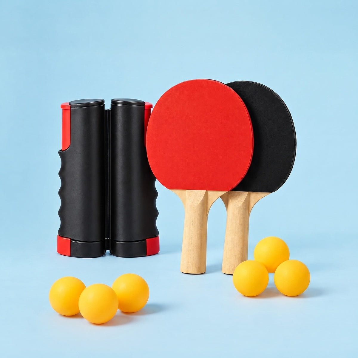 Portabelt pingisset med tre extra bollar framför, sex bollar totalt